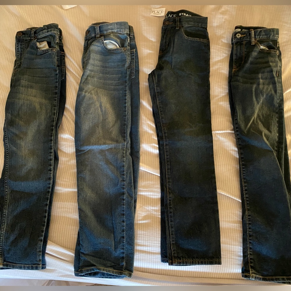 four pairs of boys 10 straight jeans.